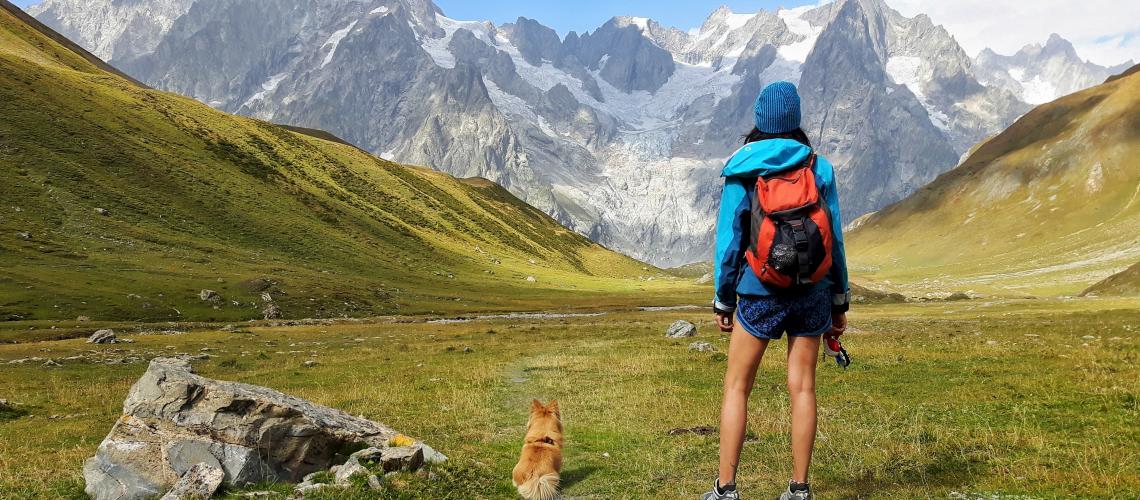 Hiker with the dog in Val Ferret ph. Alessandro Bianchet